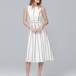 SLEEVELESS SEAMED FIT-AND-FLARE DRESS

STYLE: 

57